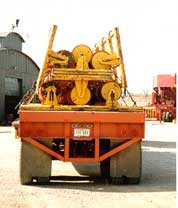 pipeline rollers stacked on 8' wide trailer